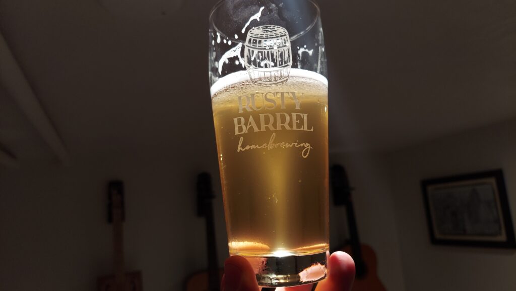 Glass of Rice Lager shines in light